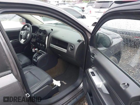 2016 Jeep Compass High Altitude Edition with VIN 1C4NJDEB2GD746490, listed as a IAAI auction lot 41704628 with 95,732 mi miles. Bid and sale history available at carsss.com. Image 5.
