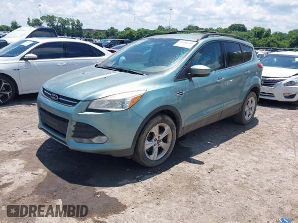 2013 Ford Escape SE z VIN 1FMCU0GX0DUA90717, wystawiony jako IAAI lot #42558297 z przebiegiem 122 785 mil mil oraz . Historia ofert i sprzedaży dostępna na DreamBid. Obrazek 2.