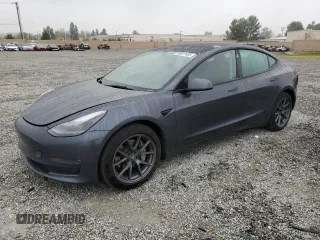 2022 Tesla Model 3 Long Range z VIN 5YJ3E1EBXNF257576, wystawiony jako Copart lot #50617405 z przebiegiem 79 157 mil mil oraz Szkoda całkowita • Salvage title. Historia ofert i sprzedaży dostępna na DreamBid. Obrazek 1.