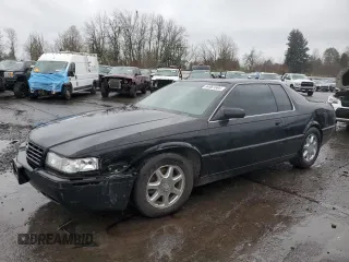 1999 Cadillac Eldorado Touring with VIN 1G6ET1294XU613176, listed as a Copart auction lot 84961664 with 96,081 mi miles and Salvage Title. Bid and sale history available at DreamBid. Image 1.
