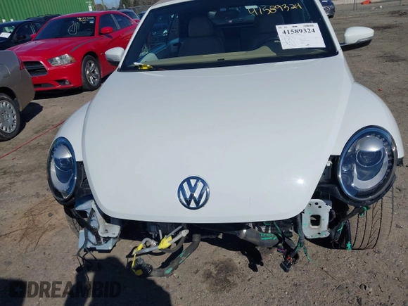 2018 Volkswagen Beetle S with VIN 3VW5DAAT1JM506988, listed as a IAAI auction lot 41589324 with 50,873 mi miles and . Bid and sale history available at DreamBid. Image 13.