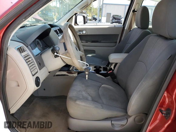 2011 Mazda Tribute Touring with VIN 4F2CY0C7XBKM00671, listed as a Copart auction lot 75431144 with 140,748 mi miles and Clean Title. Bid and sale history available at carsss.com. Image 7.