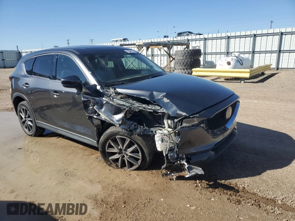2018 Mazda CX-5 Grand Touring with VIN JM3KFADM6J0339204, listed as a Copart auction lot 48153655 with 85,900 mi miles and Clean Title. Bid and sale history available at DreamBid. Image 4.