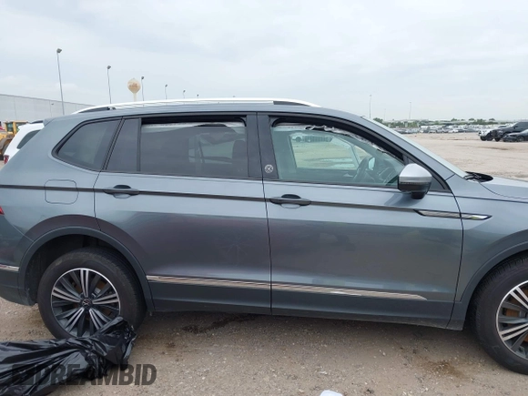 2024 Volkswagen Tiguan Wolfsburg Edition with VIN 3VV5B7AX6RM234966, listed as a IAAI auction lot 42780418 with 11,793 mi miles and . Bid and sale history available at DreamBid. Image 12.