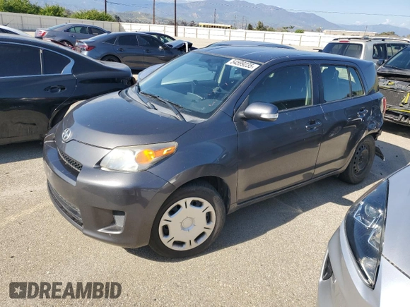 2014 Scion xD with VIN JTKKUPB41E1046114, listed as a Copart auction lot 54599235 with 125,979 mi miles and Salvage title. Bid and sale history available at DreamBid. Image 1.