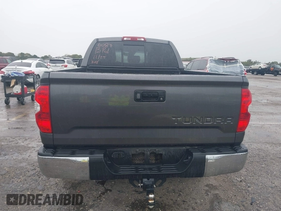 2019 Toyota Tundra 2WD SR with VIN 5TFRY5F16KX246087, listed as a IAAI auction lot 41650708 with 99,187 mi miles. Bid and sale history available at carsss.com. Image 16.