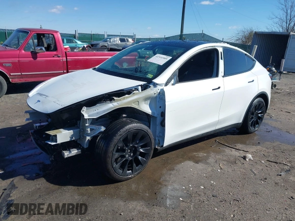 2021 Tesla Model Y Long Range with VIN 5YJYGAEE6MF196610, listed as a IAAI auction lot 41516909 with 30,431 mi miles. Bid and sale history available at carsss.com. Image 20.