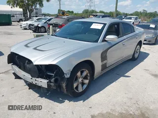 2012 Dodge Charger SE with VIN 2C3CDXBG5CH119493, listed as a IAAI auction lot 42126739 with 138,464 mi miles and . Bid and sale history available at carsss.com. Image 2.