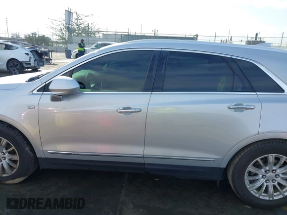 2017 Cadillac XT5 FWD with VIN 1GYKNARS7HZ144148, listed as a IAAI auction lot 41392399 with 96,252 mi miles and . Bid and sale history available at carsss.com. Image 14.