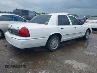 2006 Mercury Grand Marquis LS Premium z VIN 2MEFM75V56X618077, wystawiony jako IAAI lot #42168194 z przebiegiem 81 756 mil mil oraz . Historia ofert i sprzedaży dostępna na DreamBid. Obrazek 4.