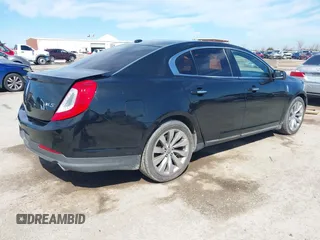 2014 Lincoln MKS with VIN 1LNHL9DK1EG604323, listed as a IAAI auction lot 41635817 with 223,136 mi miles. Bid and sale history available at carsss.com. Image 4.