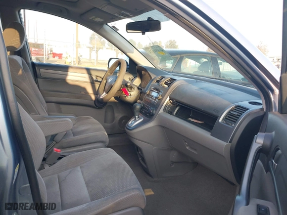 2008 Honda CR-V EX with VIN 3CZRE38568G706370, listed as a IAAI auction lot 41031674 with 124,494 mi miles. Bid and sale history available at carsss.com. Image 5.
