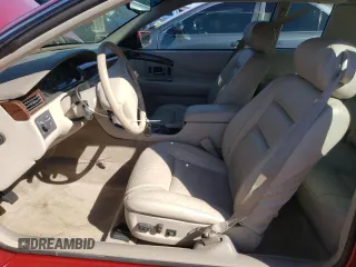 2000 Cadillac Eldorado Touring ETC z VIN 1G6ET129XYU191433, wystawiony jako Copart lot #58108224 z przebiegiem 76 957 mil mil oraz Szkody całkowita. Historia ofert i sprzedaży dostępna na DreamBid. Obrazek 7.