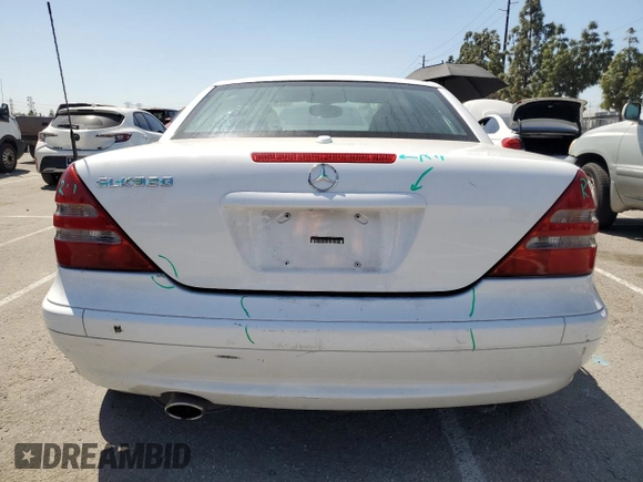2001 Mercedes-Benz SLK-Class with VIN WDBKK65F81F210099, listed as a Copart auction lot 52606105 with 129,849 mi miles and Salvage Title. Bid and sale history available at carsss.com. Image 6.
