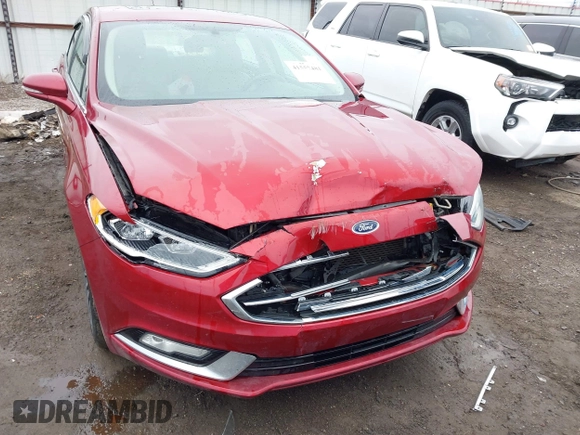 2017 Ford Fusion SE z VIN 3FA6P0H98HR175087, wystawiony jako IAAI lot #41557481 z przebiegiem 103 752 mil mil oraz . Historia ofert i sprzedaży dostępna na DreamBid. Obrazek 6.