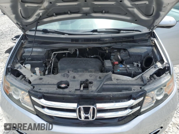 2015 Honda Odyssey Touring Elite z VIN 5FNRL5H93FB041067, wystawiony jako Copart lot #58329355 z przebiegiem 72 000 mil mil oraz Szkoda całkowita • Salvage title. Historia ofert i sprzedaży dostępna na DreamBid. Obrazek 12.