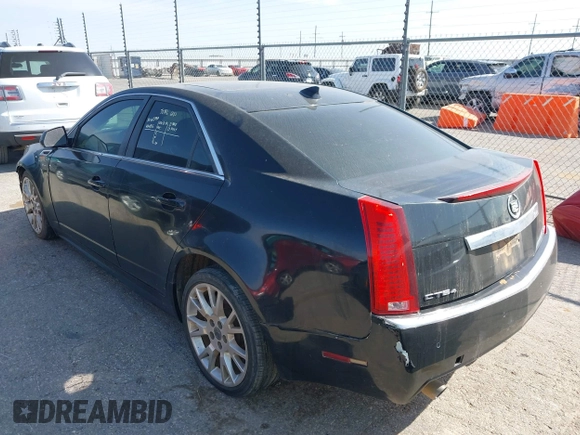 2011 Cadillac CTS Premium with VIN 1G6DS5ED9B0151820, listed as a IAAI auction lot 41909346 with 142,007 mi miles. Bid and sale history available at carsss.com. Image 3.