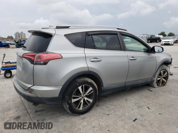 2018 Toyota RAV4 XLE with VIN 2T3WFREV2JW446388, listed as a Copart auction lot 54000675 with Not Provided miles and Salvage Title. Bid and sale history available at DreamBid. Image 3.