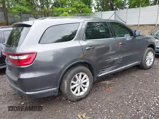 2015 Dodge Durango SXT with VIN 1C4RDJAG6FC177561, listed as a IAAI auction lot 42314437 with 104,898 mi miles and . Bid and sale history available at DreamBid. Image 4.