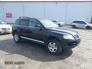 2005 Volkswagen Touareg 3.2L V6 with VIN WVGZG77L55D062565, listed as a IAAI auction lot 41564790 with 153,762 mi miles and . Bid and sale history available at DreamBid. Image 1.