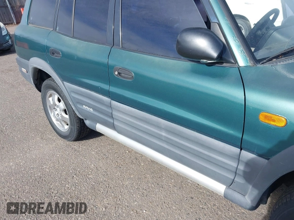 1997 Toyota RAV4 with VIN JT3HP10V2V0147285, listed as a IAAI auction lot 41856796 with 303,535 mi miles and . Bid and sale history available at DreamBid. Image 6.
