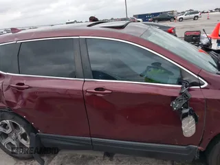 2019 Honda CR-V EX-L with VIN 7FARW1H83KE017311, listed as a IAAI auction lot 41513670 with 87,196 mi miles. Bid and sale history available at carsss.com. Image 14.