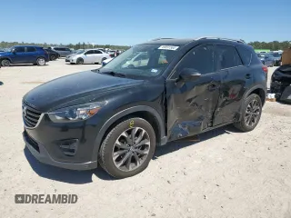 2016 Mazda CX-5 Grand Touring with VIN JM3KE4DY5G0783531, listed as a Copart auction lot 49891565 with 106,066 mi miles and Salvage Title. Bid and sale history available at carsss.com. Image 1.
