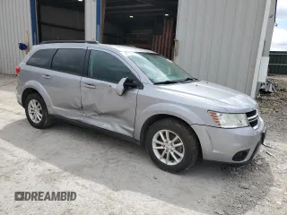 2015 Dodge Journey SXT with VIN 3C4PDCBB2FT688310, listed as a Copart auction lot 44918515 with 160,297 mi miles and Salvage Title. Bid and sale history available at DreamBid. Image 4.