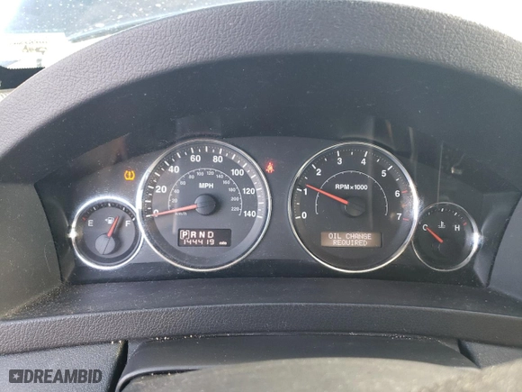 2009 Jeep Grand Cherokee Laredo with VIN 1J8GS48K09C525473, listed as a Copart auction lot 84880384 with 144,419 mi miles and Salvage Title. Bid and sale history available at carsss.com. Image 9.