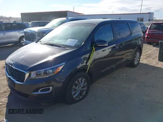 2021 Kia Sedona EX with VIN KNDMB5C19M6671229, listed as a IAAI auction lot 41066675 with 168,393 mi miles. Bid and sale history available at carsss.com. Image 17.