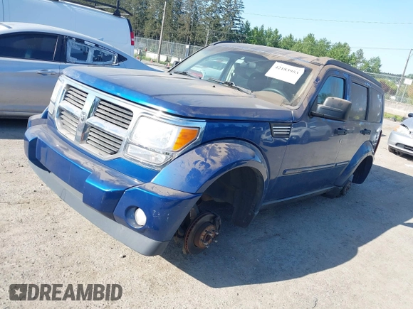 2010 Dodge Nitro SE with VIN 1D4PT2GK4AW141616, listed as a IAAI auction lot 42183953 with 128,023 mi miles. Bid and sale history available at carsss.com. Image 2.