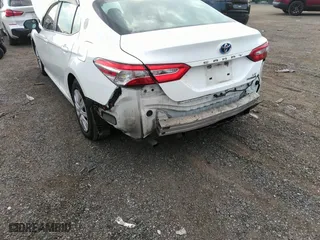 2020 Toyota Camry Hybrid LE with VIN 4T1C31AK2LU518579, listed as a IAAI auction lot 39981154 with 115,005 mi miles. Bid and sale history available at carsss.com. Image 6.