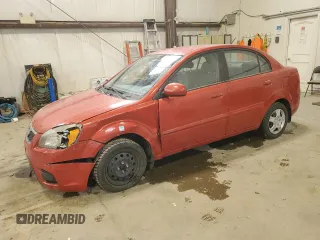 2010 Kia Rio with VIN KNADH4B39A6691792, listed as a Copart auction lot 80043064 with 161,139 mi miles and Salvage Title. Bid and sale history available at DreamBid. Image 1.