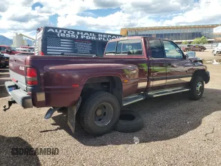2001 Dodge 3500 with VIN 1B7MF33651J244711, listed as a Copart auction lot 68735784 with 253,795 mi miles and Salvage Title. Bid and sale history available at carsss.com. Image 3.