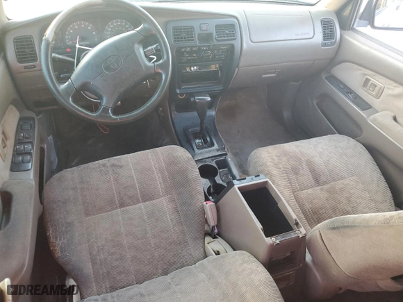 2000 Toyota 4Runner with VIN JT3GM84RXY0063021, listed as a Copart auction lot 82144274 with 310,186 mi miles and Salvage Title. Bid and sale history available at carsss.com. Image 8.