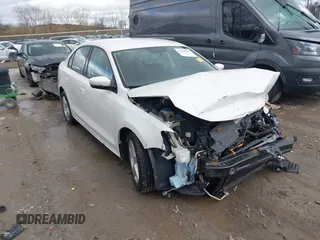 2012 Volkswagen Jetta TDI w/Premium & Nav z VIN 3VWLL7AJ8CM094552, wystawiony jako IAAI lot #41962900 z przebiegiem 158 868 mil mil oraz . Historia ofert i sprzedaży dostępna na DreamBid. Obrazek 1.
