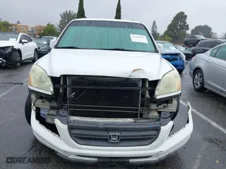 2003 Honda Pilot EX with VIN 2HKYF186X3H589128, listed as a IAAI auction lot 41546551 with 144,365 mi miles. Bid and sale history available at carsss.com. Image 6.