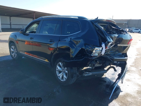 2018 Volkswagen Atlas SEL with VIN 1V2ER2CAXJC582408, listed as a IAAI auction lot 41389461 with 60,822 mi miles and . Bid and sale history available at DreamBid. Image 3.