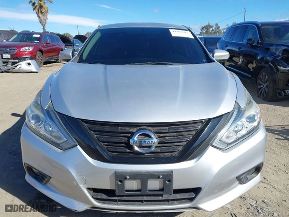 2018 Nissan Altima 2.5 SR with VIN 1N4AL3AP8JC245126, listed as a IAAI auction lot 41703017 with 101,292 mi miles. Bid and sale history available at carsss.com. Image 13.