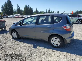 2013 Honda Fit с VIN JHMGE8H34DC069516, выставлен на аукционе Copart как лот 59993335 с пробегом 128 798 миль миль и Списание • Salvage title. История ставок и продаж доступна на DreamBid. Изображение 2.