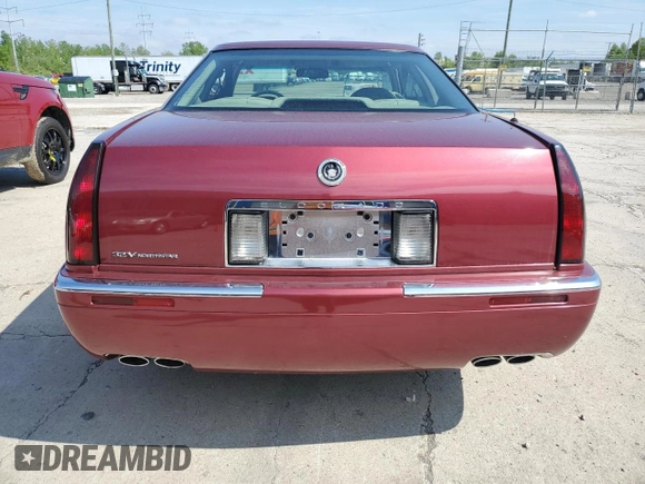 1997 Cadillac Eldorado ESC z VIN 1G6EL12Y5VU614955, wystawiony jako Copart lot #56222345 z przebiegiem 62 030 mil mil oraz Tytuł czysty. Historia ofert i sprzedaży dostępna na DreamBid. Obrazek 6.