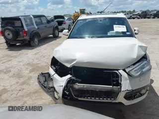 2015 Audi Q3 Prestige with VIN WA1GFCFS1FR007092, listed as a IAAI auction lot 42588730 with 85,290 mi miles and . Bid and sale history available at DreamBid. Image 12.