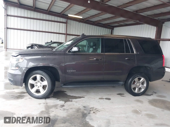2017 Chevrolet Tahoe LT with VIN 1GNSKBKC8HR326004, listed as a IAAI auction lot 42256494 with 101,486 mi miles and . Bid and sale history available at DreamBid. Image 15.