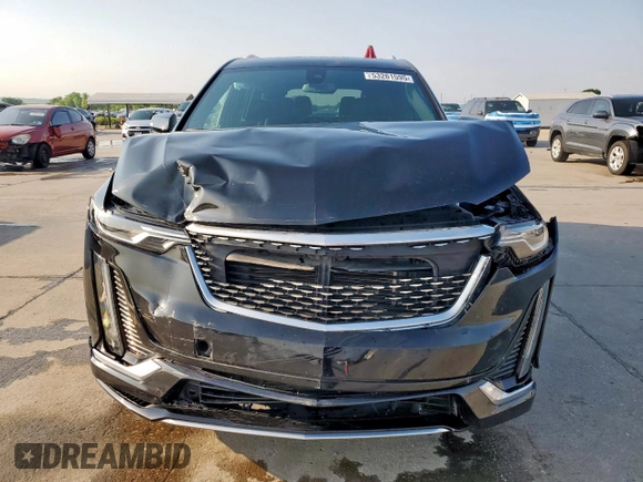 2021 Cadillac XT6 Premium Luxury z VIN 1GYKPCRS3MZ195999, wystawiony jako Copart lot #53261595 z przebiegiem 81 843 mil mil oraz Szkoda całkowita • Salvage title. Historia ofert i sprzedaży dostępna na DreamBid. Obrazek 5.