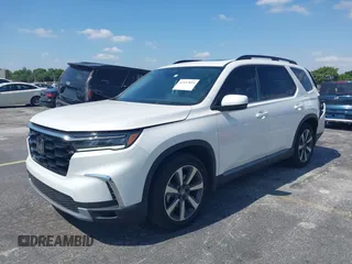 2024 Honda Pilot Touring z VIN 5FNYG2H72RB016937, wystawiony jako IAAI lot #42137854 z przebiegiem 18 028 mil mil oraz . Historia ofert i sprzedaży dostępna na DreamBid. Obrazek 17.