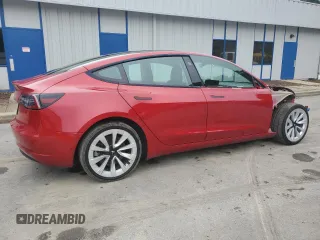 2023 Tesla Model 3 with VIN 5YJ3E1EA6PF437390, listed as a Copart auction lot 62825135 with 115,121 mi miles and Clean title. Bid and sale history available at DreamBid. Image 3.