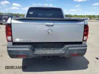 2017 Honda Ridgeline RTL-T with VIN 5FPYK3F65HB012868, listed as a Copart auction lot 57562885 with 115,530 mi miles and Salvage title. Bid and sale history available at DreamBid. Image 6.