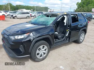 2021 Toyota RAV4 LE with VIN 2T3F1RFV9MC254808, listed as a IAAI auction lot 42326876 with 71,560 mi miles and . Bid and sale history available at DreamBid. Image 6.