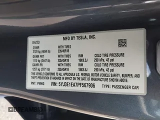 2023 Tesla Model 3 with VIN 5YJ3E1EA7PF567906, listed as a IAAI auction lot 42280993 with 41,452 mi miles and . Bid and sale history available at DreamBid. Image 9.