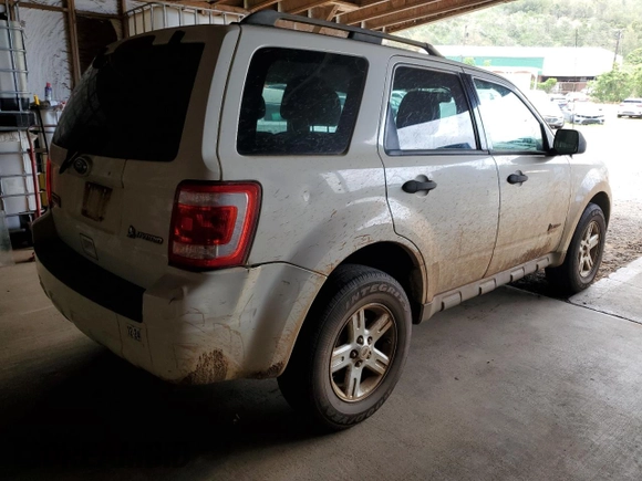 2010 Ford Escape Hybrid z VIN 1FMCU4K32AKA08232, wystawiony jako Copart lot #55356045 z przebiegiem 118 496 mil mil oraz Szkoda całkowita • Salvage title. Historia ofert i sprzedaży dostępna na DreamBid. Obrazek 3.